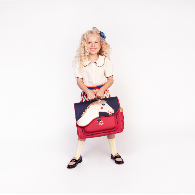 Trendy schoolbag for children from 6 to 8 years old. This Jeune Premier It Bag Midi Saddle Bag is a real back-to-school essential.