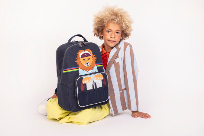Boy wearing Jeune Premier New Bobbie King of the Cobbles school backpack, age 6 and up