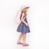 Girl wearing Jeune Premier New Bobbie Blush ergonomic school backpack, age 6 and up