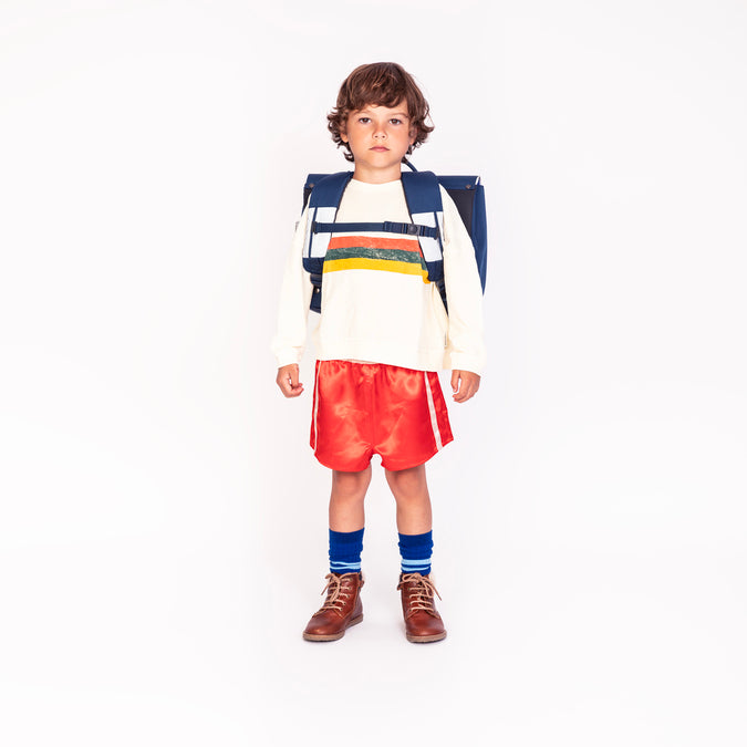 Boy wearing Jeune Premier It Bag Midi Supercats school bag, age 6 to 8
