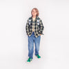 Boy wearing Jeune Premier New Bobbie Puffer Green school backpack, age 6 and up